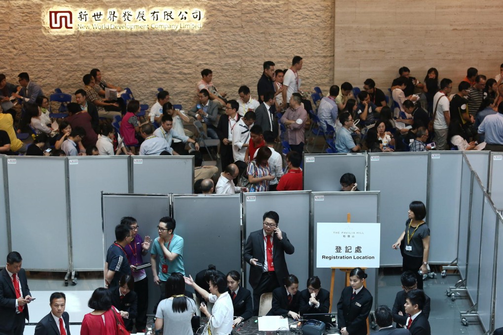 Potential buyers waiting at the sale office of the Pavilia in Tsuen Wan, which is developed by New World. Photo: Jonathan Wong