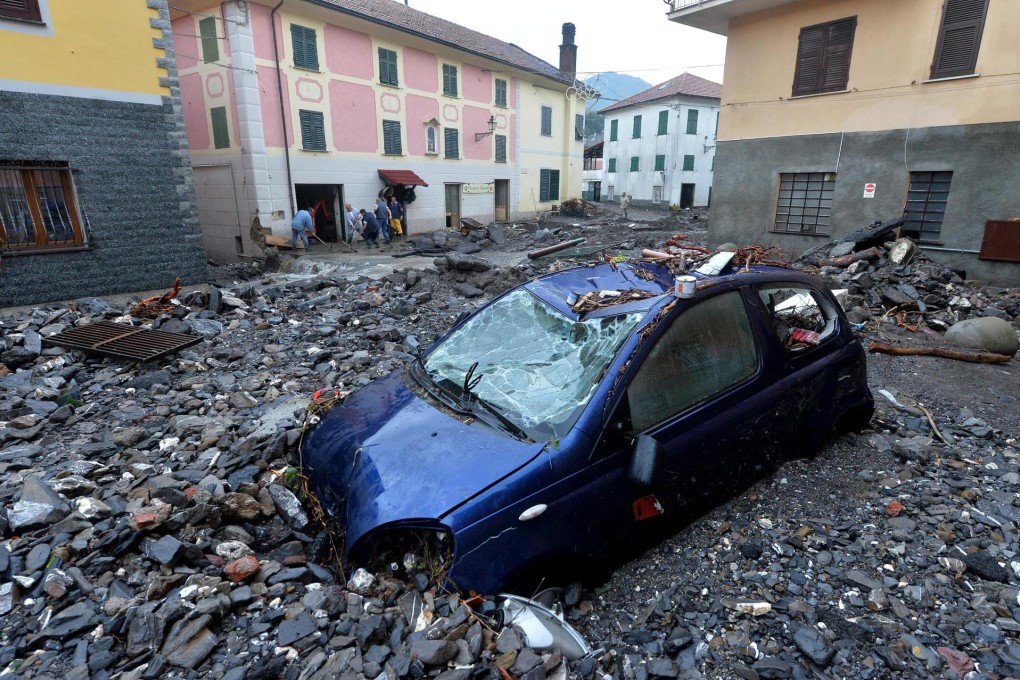 Flood debris clutters the Italian town of Montoggio, near Genoa, yesterday. Photo: EPA
