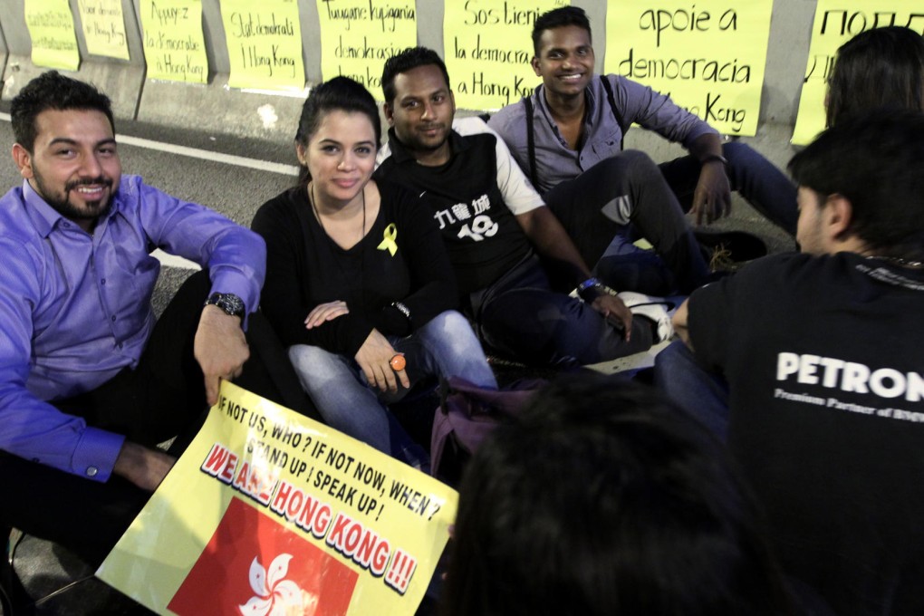Sunny Shehzad, Ansah Malik, Jeffrey Andrews and Karthi Duraisamy join protesters in Admiralty. Photo: Edward Wong