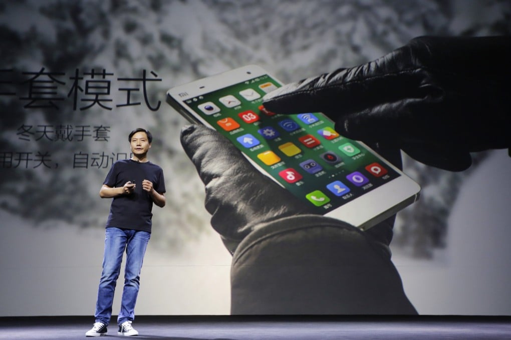Lei Jun, CEO mobile company Xiaomi, introduces Xiaomi Phone 4 at a launching ceremony in Beijing. Photo: Reuters