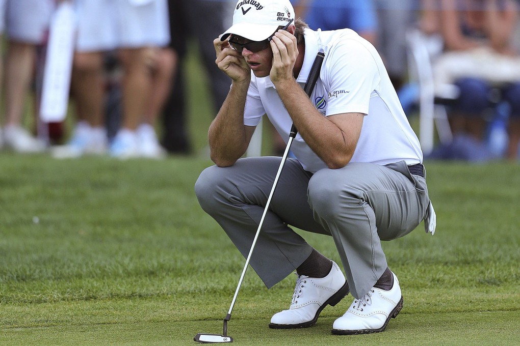 Belgium's Nicolas Colsaerts lines up a putt at the Portugal Masters at Oceanico Victoria Golf Club in Vilamoura. The third and final round was abandoned because of bad weather. Photo: EPA