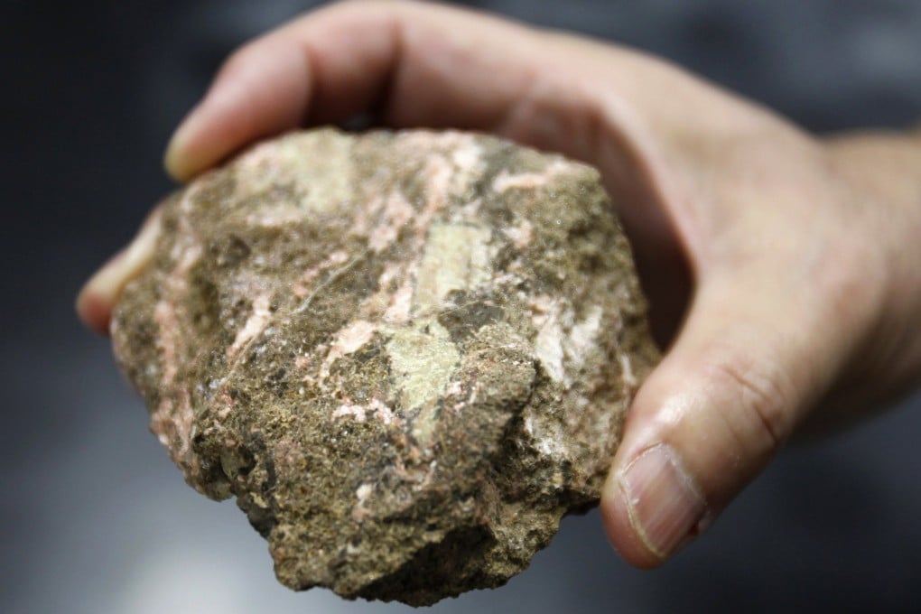 A rare-earth mineral is shown in Tokyo.  China meets more than 90 per cent of the global demand for them. Photo: Reuters