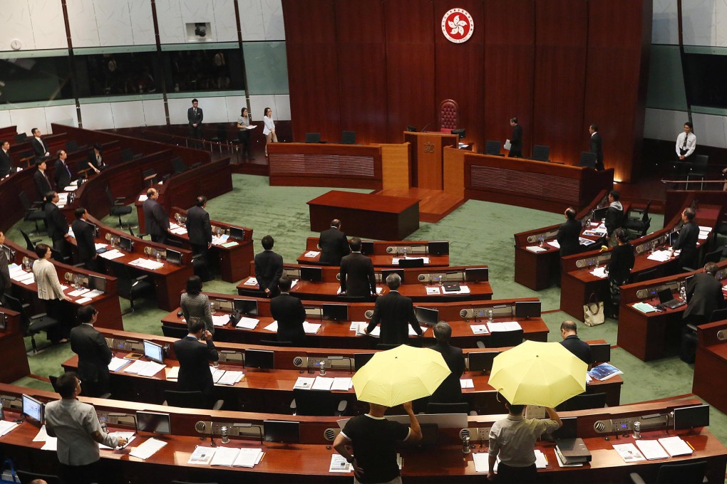 Umbrellas are seen as yesterday's Legco meeting begins. Photo: Sam Tsang