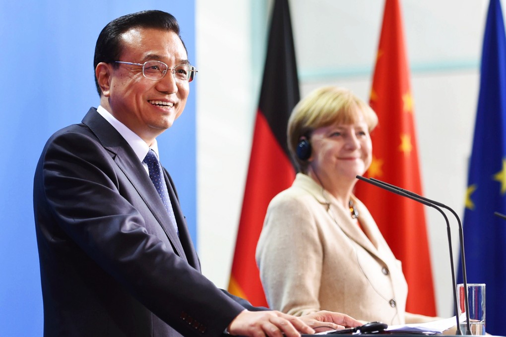 Chinese Premier Li Keqiang and German Chancellor Angela Merkel attend a press conference in Berlin. Germany has described the arrest last Friday of a Chinese woman working for a German newspaper on the mainland as "worrying". Photo: Xinhua