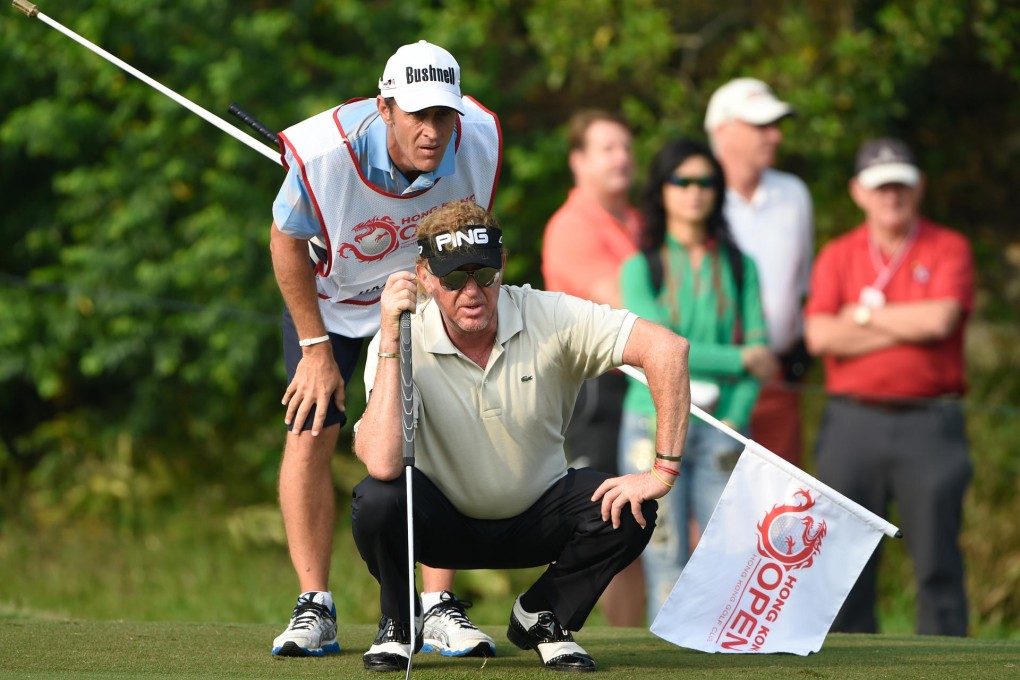 Spaniard Miguel Angel Jimenez tries to read the green during the first round of the Hong Kong Open at Fanling on Thursday. The four-time defending champion was suffering from an upset stomach and opened with a two-over 72. Photo: Richard Castka