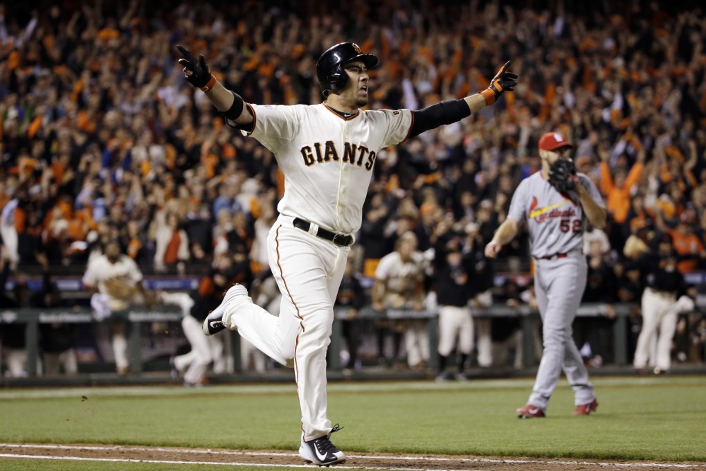 Travis Ishikawa rounds the bases after his three-run homer. Photo: AP