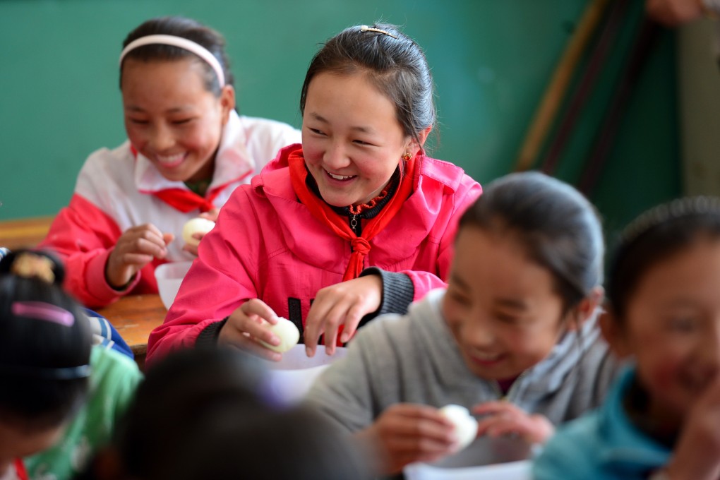 More than four million rural primary and middle school pupils across Guizhou province will benefit from a scheme to improve their diet, the Guizhou Du Shi Bao reports. Photo: Xinhua