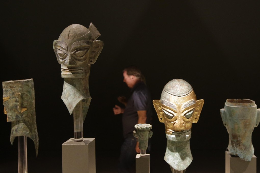 Otherworldly figures in the "China's Lost Civilisation: The Mystery of Sanxingdui" exhibition. Photo: AP