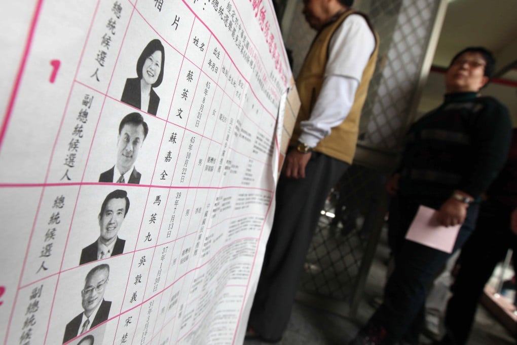 People wait for their turn to vote in the 2012 Taiwan Presidential Election at a polling station in Taipei.