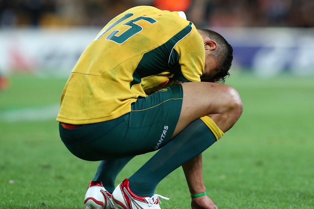 A heartbreaking loss to the All Blacks, followed by the sensational resignation of Ewen McKenzie has plunged Australian rugby into turmoil. Photos: AP
