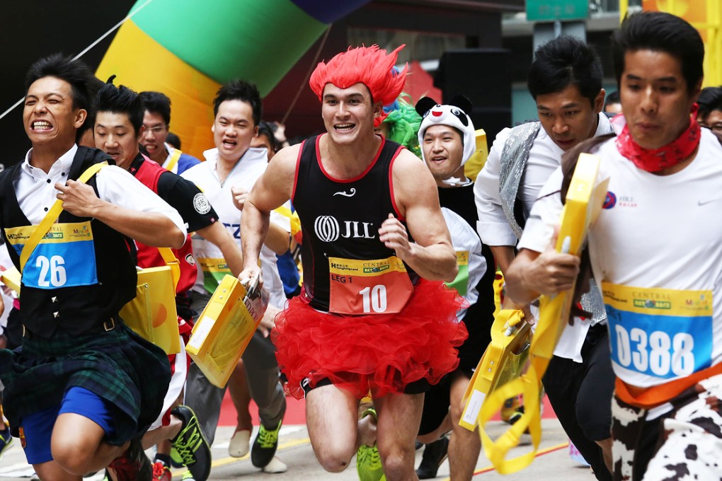 Runners hit the streets of Central dressed in all kinds of fancy dress. Photo: Jonathan Wong