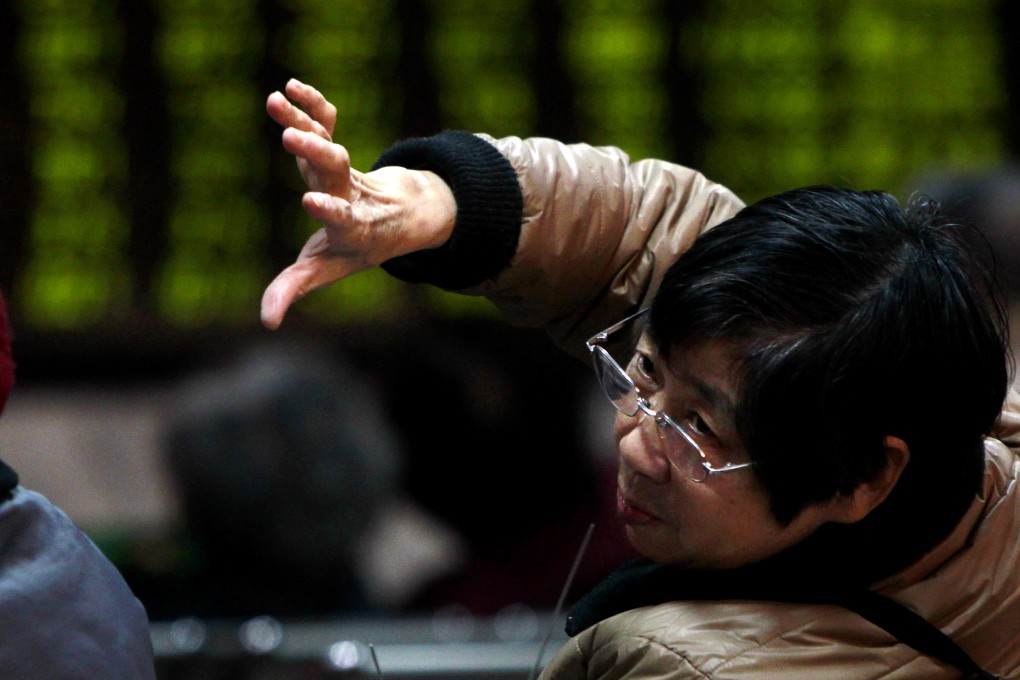 The stock through train scheme will mark the first time overseas retail investors can trade in A shares. Photo: Xinhua