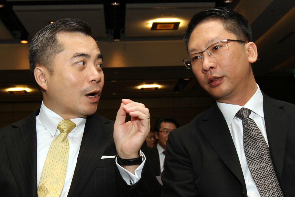 Wong Yan-lung in 2012 with Rimsky Yuen, now justice secretary. Wong has advised students who will face Yuen later today. Photo: David Wong