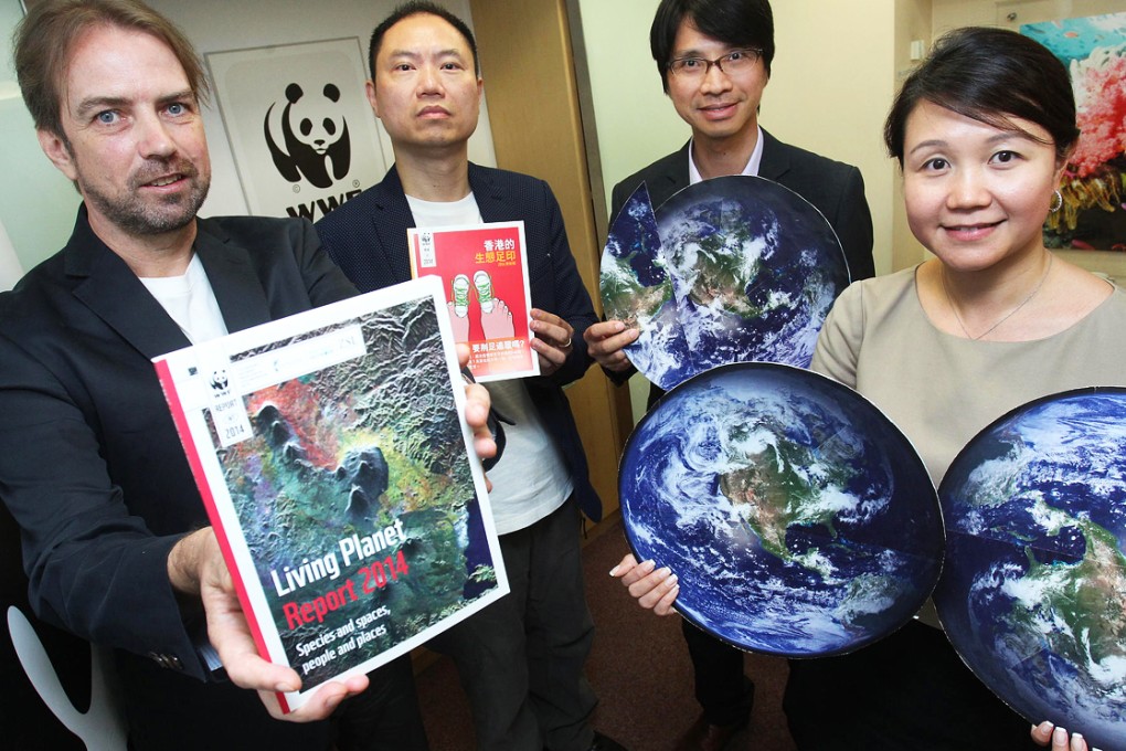 WWF officials (from left) Gavin Edwards and Cheung Chi-wah join Samuel Kwong of Swire and Natalie Chan of Hong Kong and Shanghai Hotels to launch the report. Photo: May Tse