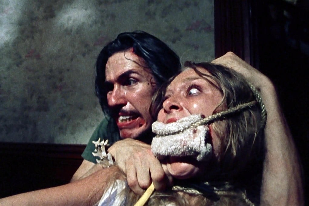 Edwin Neal menaces Marilyn Burns in one of the scenes that helped set a new benchmark in gothic horror.
