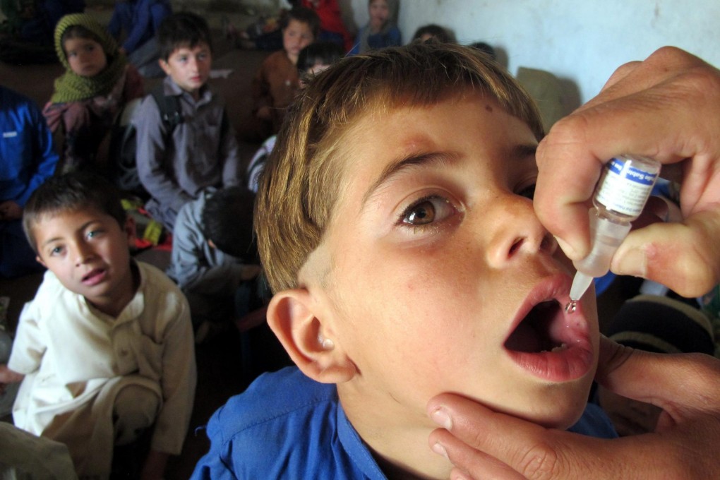 A child is vaccinated. Photo: EPA