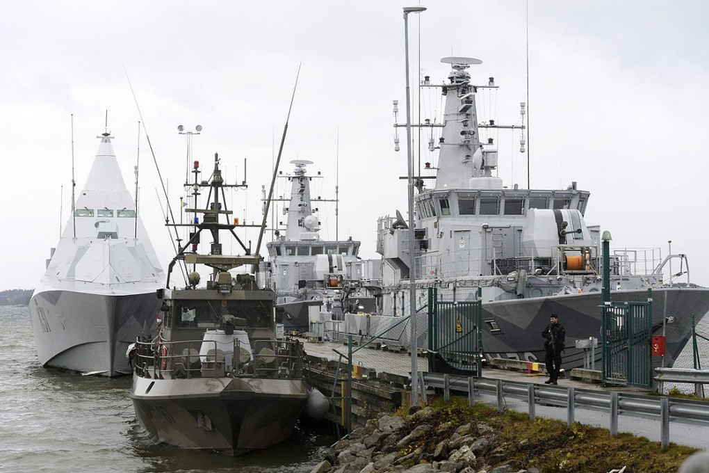 Swedish naval vessels lie moored at the jetty at Berga marine base outside Stockholm earlier this week. Photo: EPA