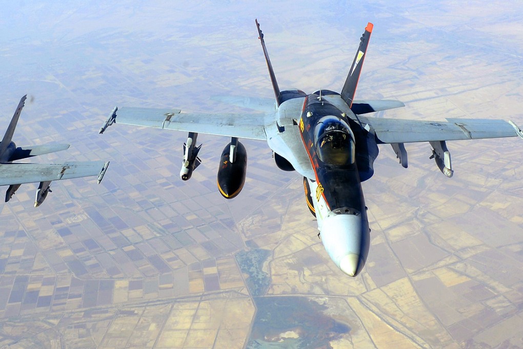 US Navy F/A-18 warplanes supporting operations against Islamic State militants over Iraq earlier this month. Photo: AFP