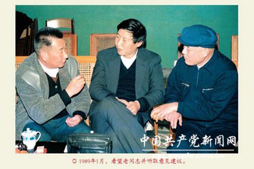 Young Xi Jinping talks to party veterans. Photo: CPC News