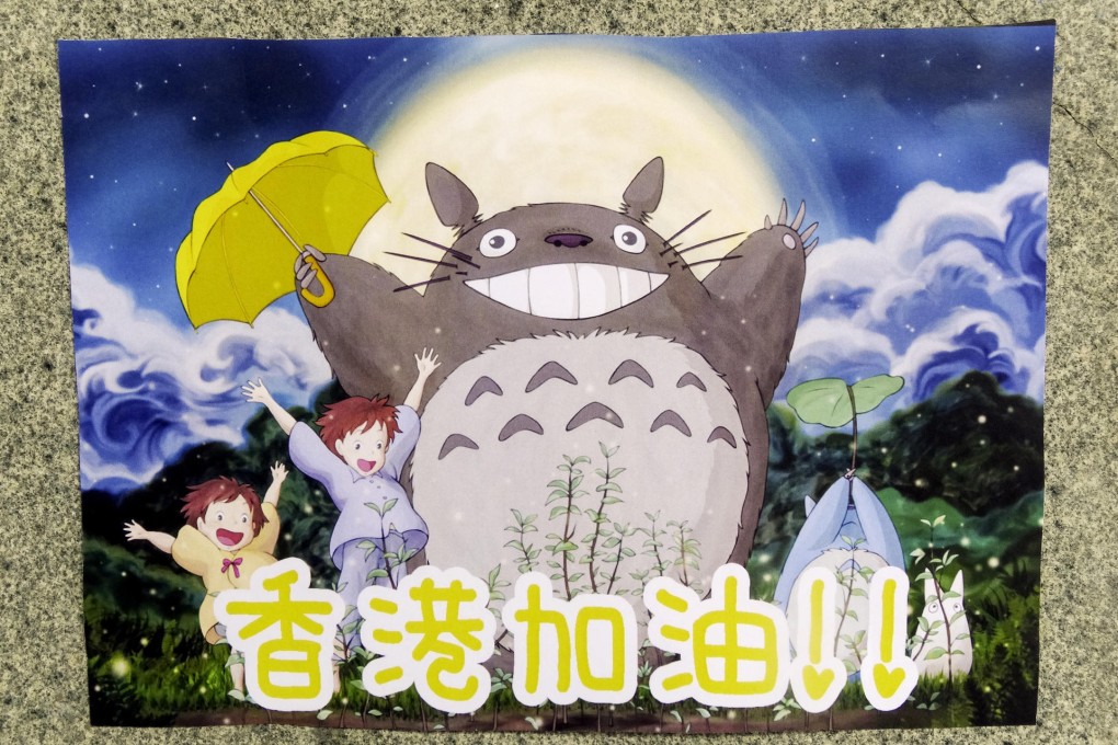 Movie-inspired protest posters, this one featuring Totoro, have been used by Occupy demonstrators. Photo: Yvonne Teh