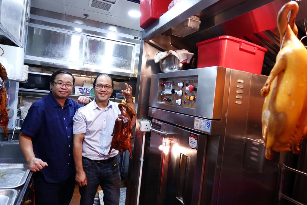 Brothers Kevin (left) and Hardy Kam thought it was best to venture out on their own. Photo: Jonathan Wong