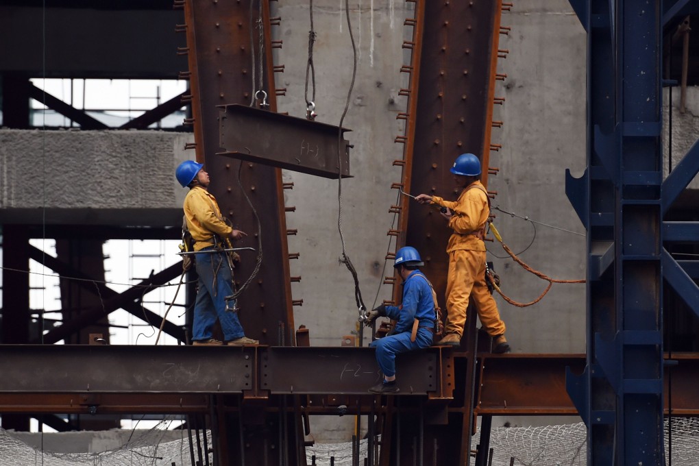 Nearly a third of fund flows from insurance firms to trust schemes was invested in property industry in China at the end of June. Photo: AFP
