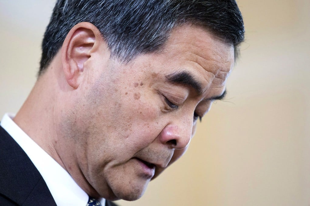 Chief Executive Leung Chun-ying's popularity sank to a record low as distrust in his government rose to an 11-month high in a poll released yesterday. Photo: Bloomberg