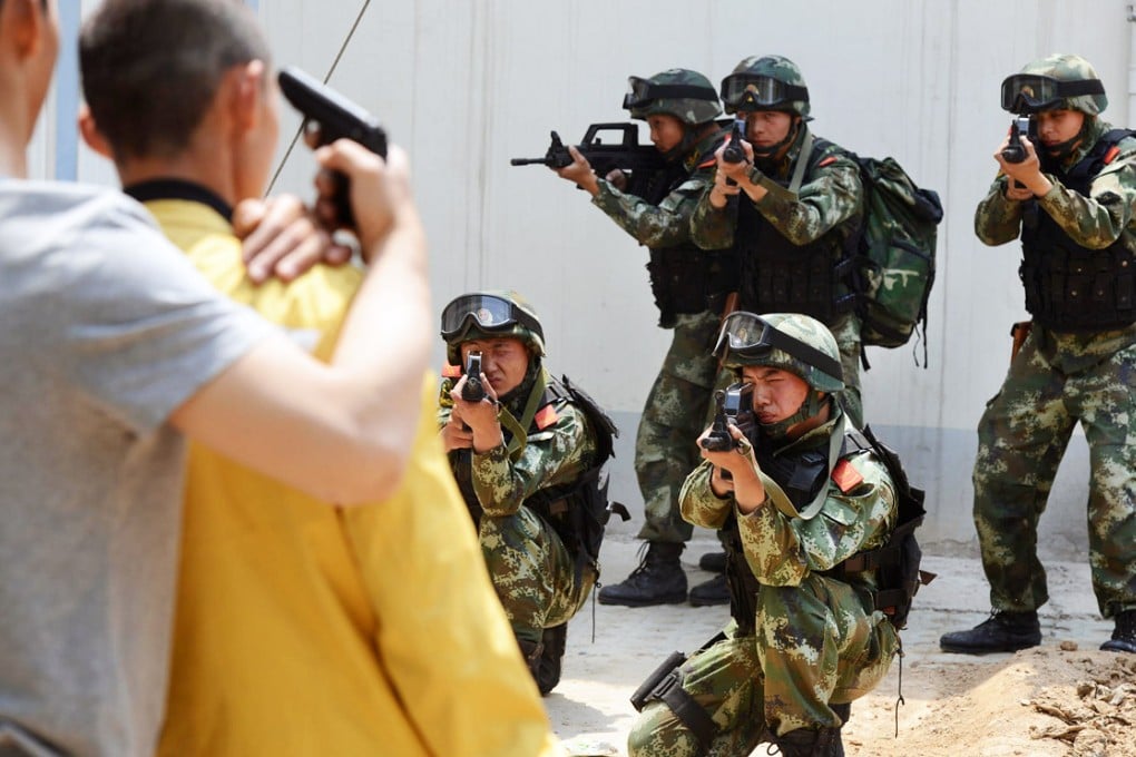 An armed police team take part in a counterterrorism exercise in Taiyuan City, Shanxi province. Photo: CNS