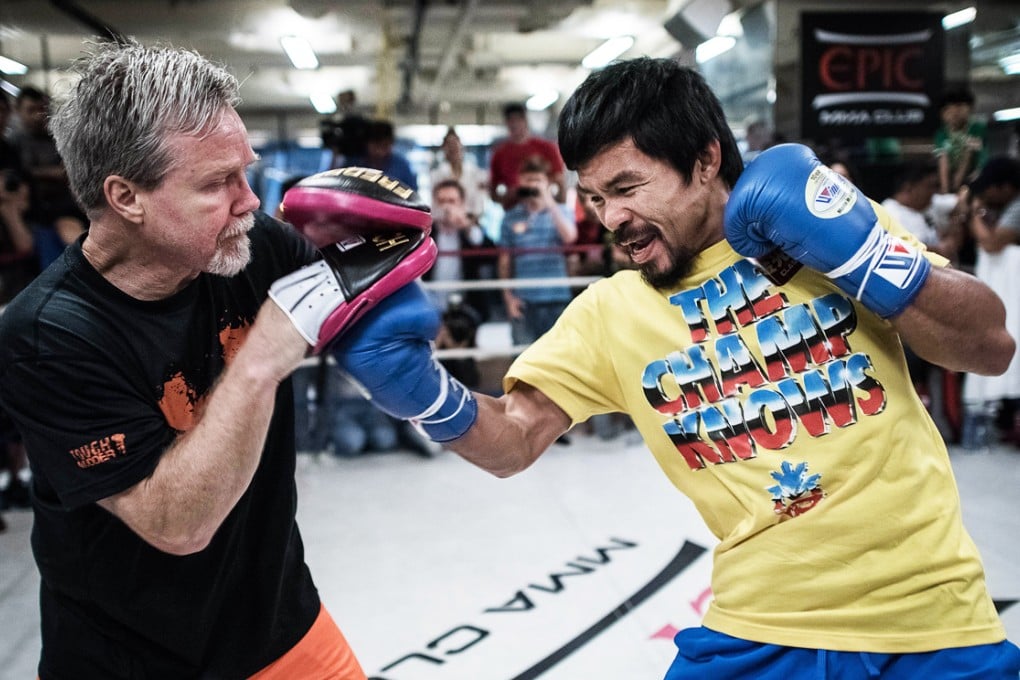 Coach Freddie Roach and Manny Pacquiao in training at the EPIC MMA Club in Central. Photo: AFP