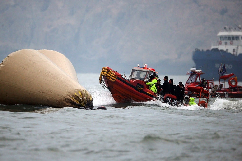 Rescuers search for victims in the first days after the sinking of the ferry. Photo: AP