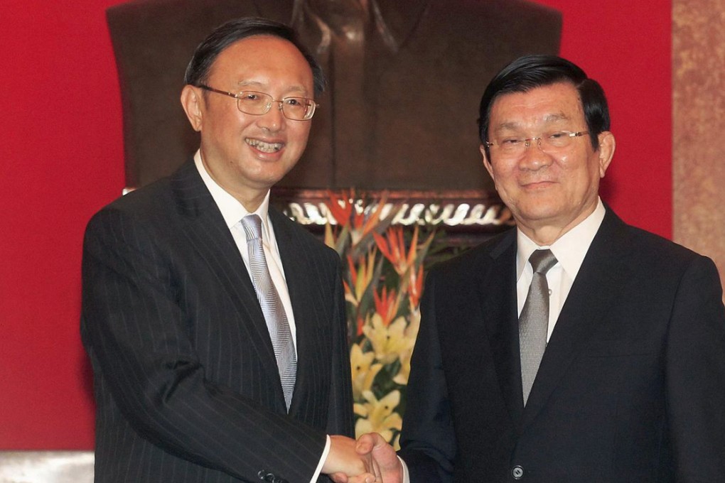 Yang Jiechi (left) and Truong Tan Sang in Hanoi. Photo: Reuters