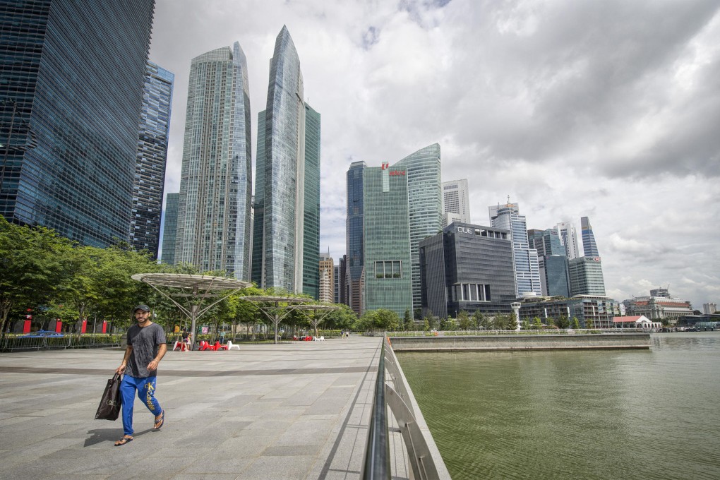 With limited upside potential at home, Singapore's property developers are seeking more investments in overseas markets. Photo: Bloomberg