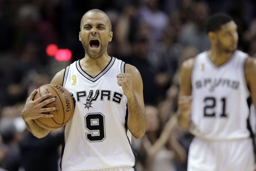 San Antonio Spurs' Tony Parker celebrates after their 101-100 NBA win over the Dallas Mavericks. Photo: AP
