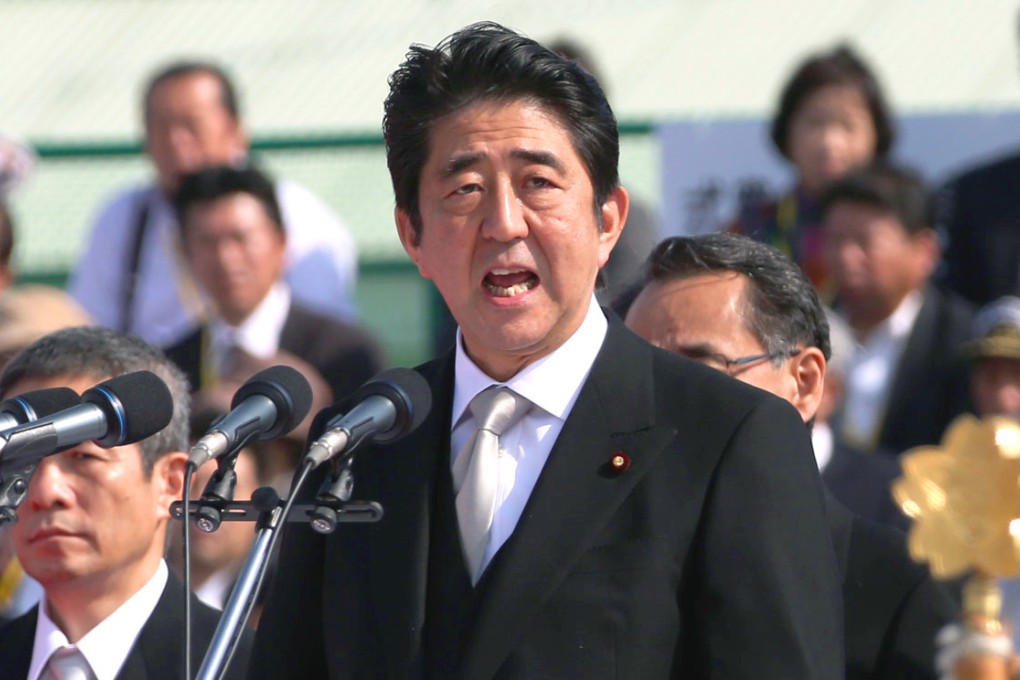 Japanese Prime Minister Shinzo Abe has given hope of banishing two decades of deflationary paralysis through his Abenomics. Photo: Xinhua