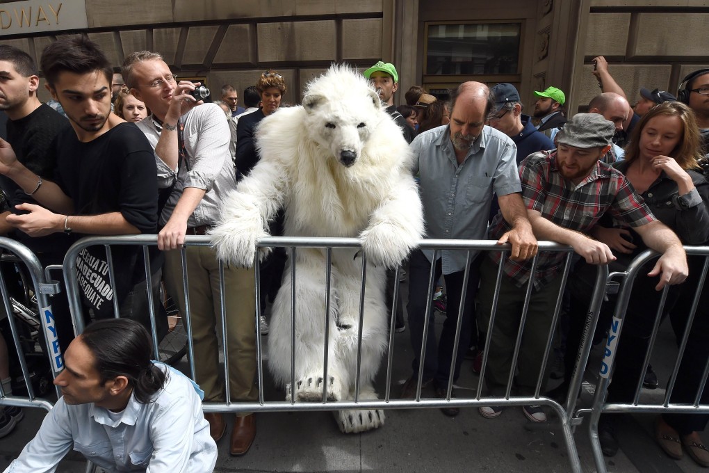 Activists push their cause in the lead-up to a United Nations climate change summit in New York last month. Photo: AFP