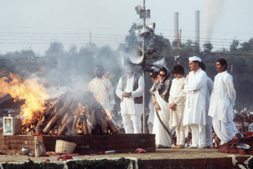 Rajiv Gandhi (second from right), Sonia (fourth from right) and daughter Priyanka (third from right) at Indira's cremation in 1984. Photo: AFP