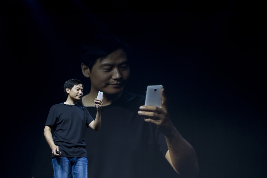Lei Jun, CEO of Xiaomi launches the new Xiaomi 4 smart phone in Beijing. Photo: Simon Song