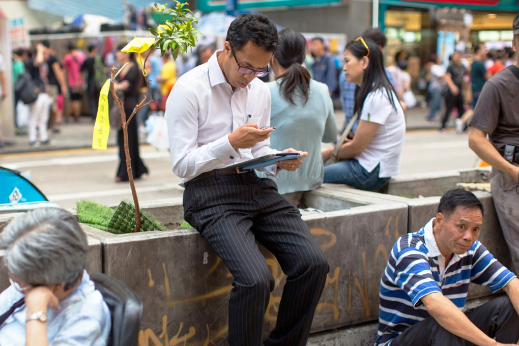 A blockaded section of Nathan Road in Mong Kok. The World Bank assesses that the pro-democracy protests have had little effect on the overall way of doing business in Hong Kong. Photo: EPA