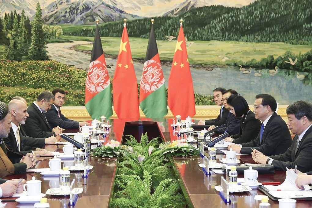 Premier Li Keqiang (second right) meets with visiting Afghan President Ashraf Ghani (second left) in Beijing on Wednesday. Photo: Xinhua