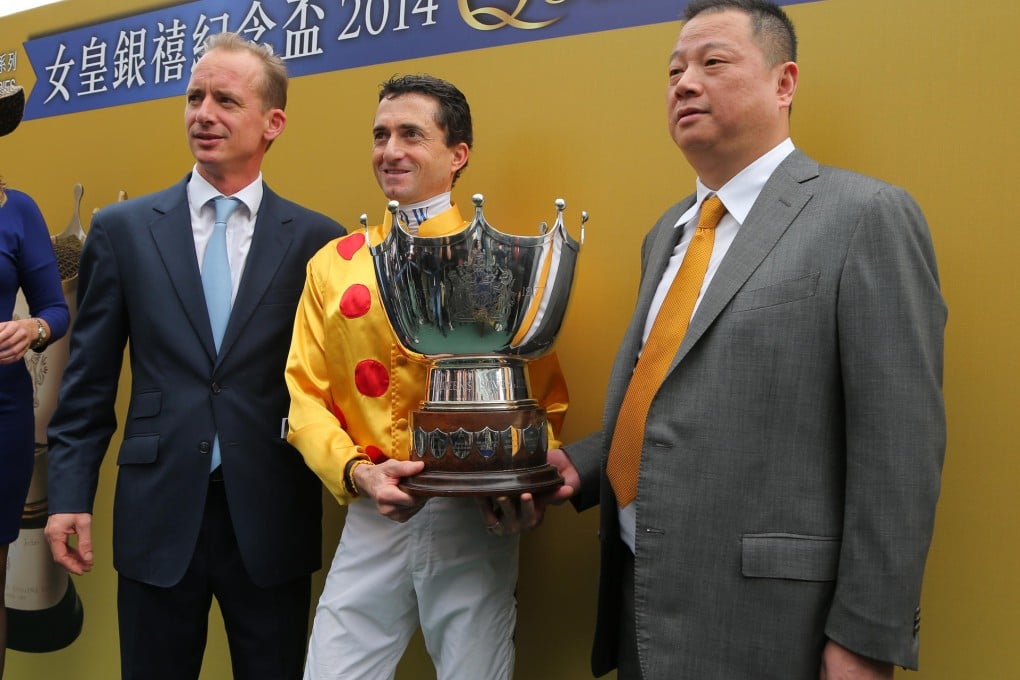 Trainer Richard Gibson, jockey Douglas Whyte and owner Pan Sutong after a win at Sha Tin.