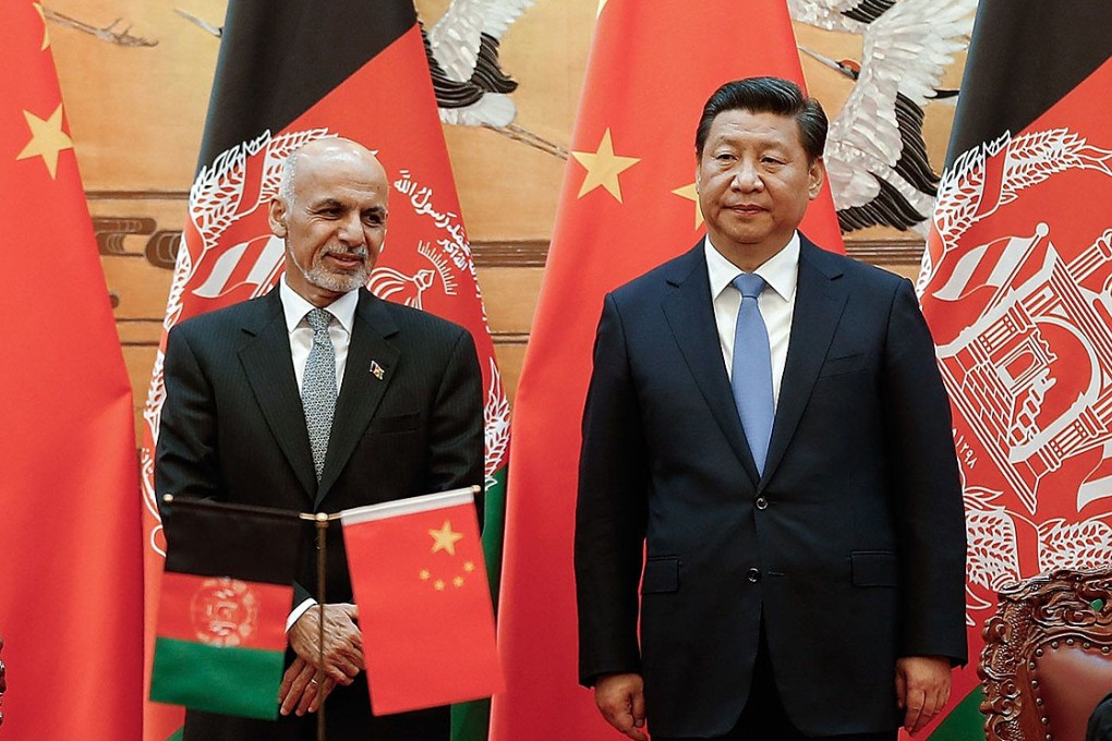 Afghan President Ashraf Ghani with President Xi Jinping at the Great Hall of the People in Beijing on Tuesday. Photo: AFP