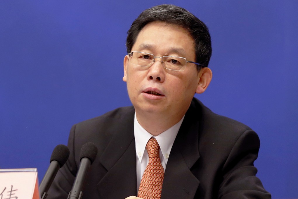 Jiang Wei answered questions about Zhou Yongkang. Photo: Xinhua