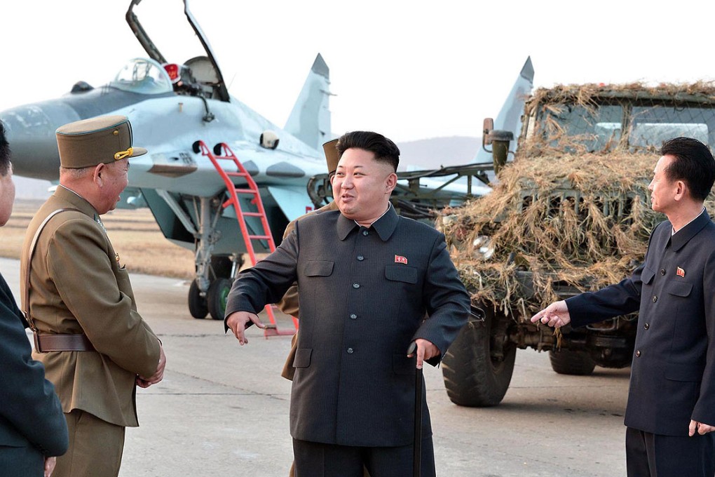North Korean leader Kim Jong-Un (centre) inspects Korean People's Army equipment at undisclosed location on Thursday. Photo: AFP