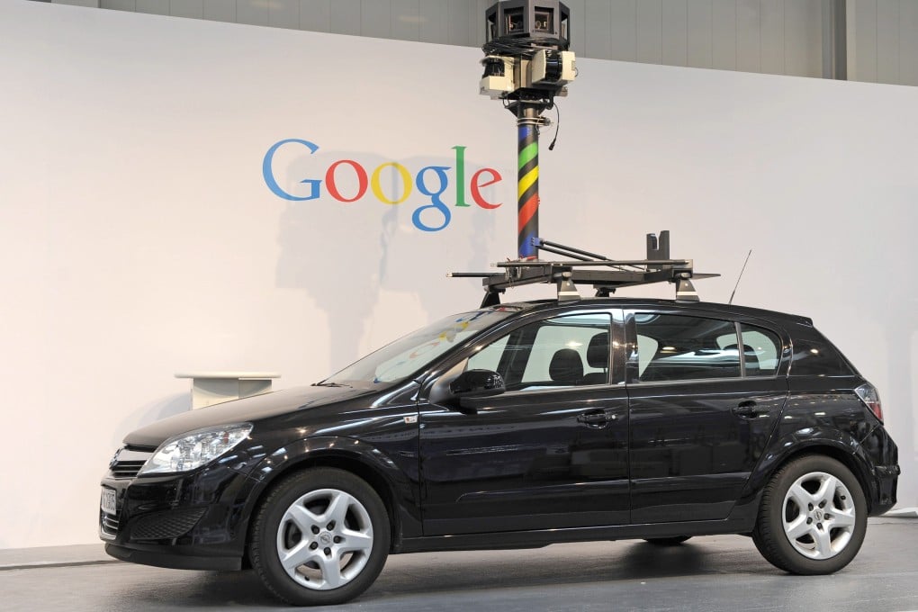 Google’s Street View cars drive around public streets with cameras that capture a 360-degree view of the environment. Photo: EPA