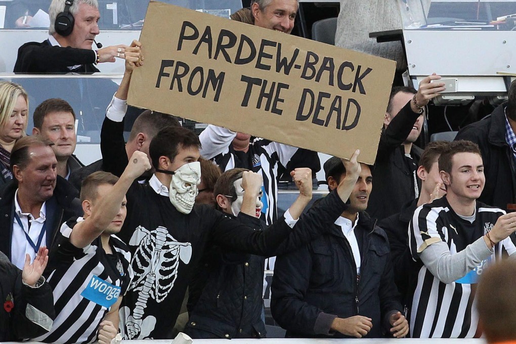 How the tide turns: Newcastle fans, once scathing of manager Alan Pardew, celebrate their current hot run under him in the Premier League. Photo: EPA