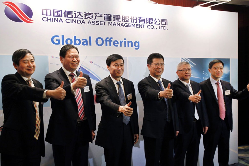 China Cinda Asset Management has grown its shadow-lending business to 158 billion yuan from 9.7 billion yuan in 2011. Photo: Reuters