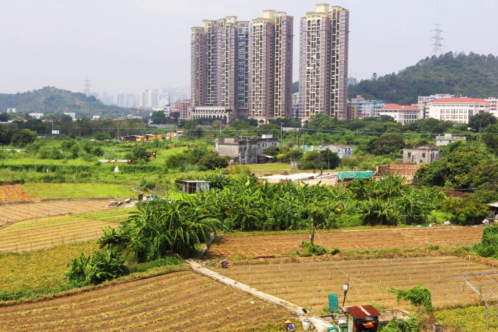The newly built Chuk Yuen Village in Ta Kwu Ling has a view of high-rises at Shenzhen's Luofang Village. Photo: Edward Wong