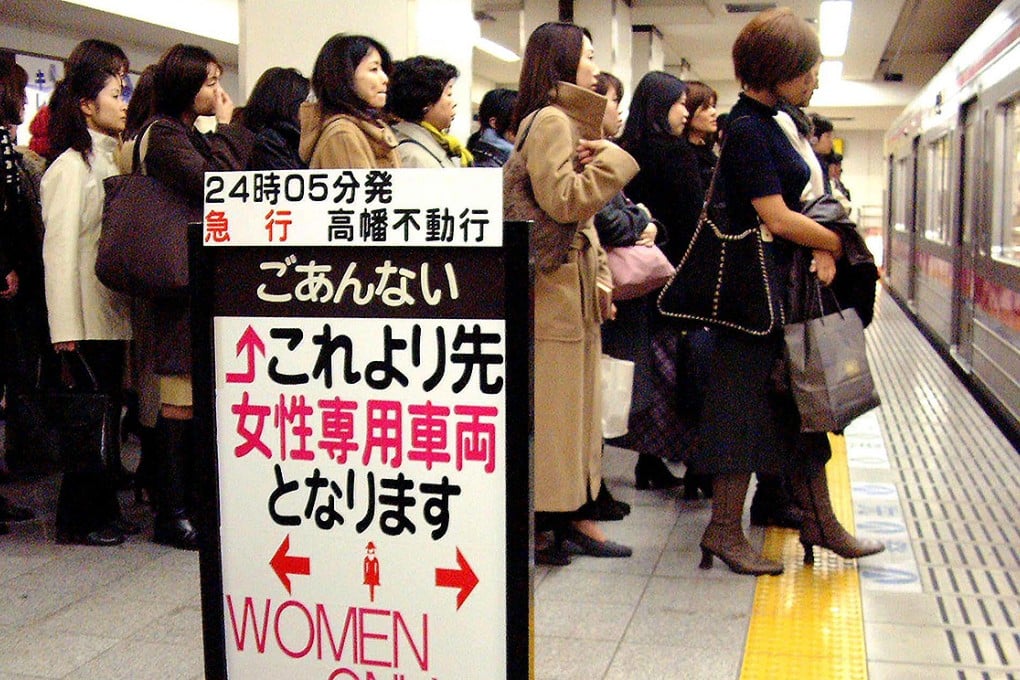 Female passengers queue up for a "Women Only" carriage at Tokyo's Shinjuku Station. Photo: AFP