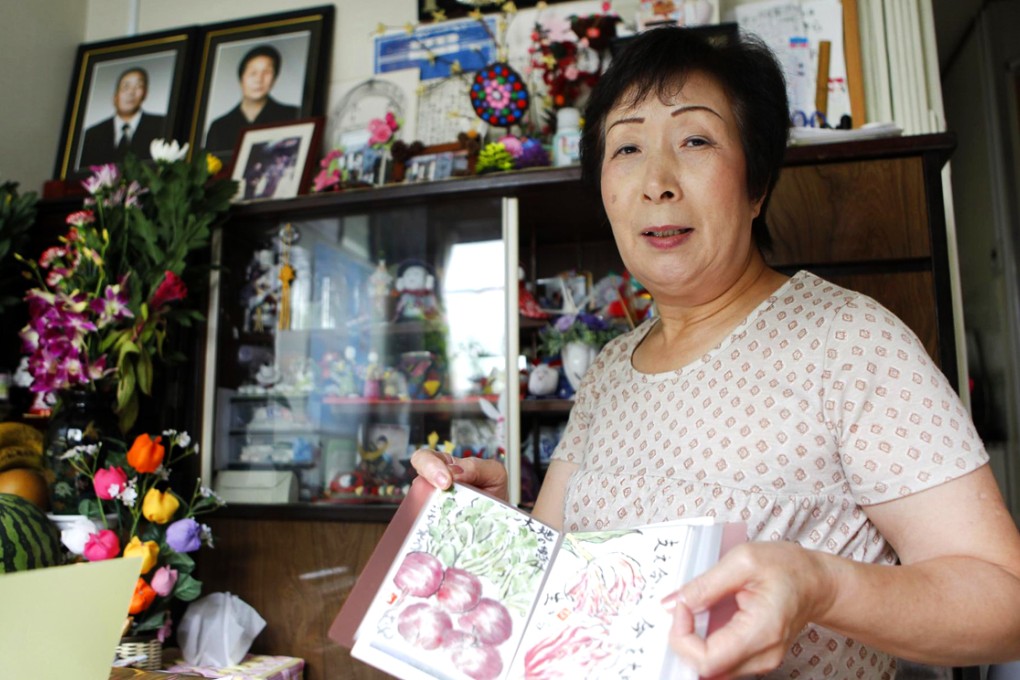 Tsunami survivor Keiko Abe is still waiting for permanent accommodation three-and-a-half years after the disaster. Photo: Reuters
