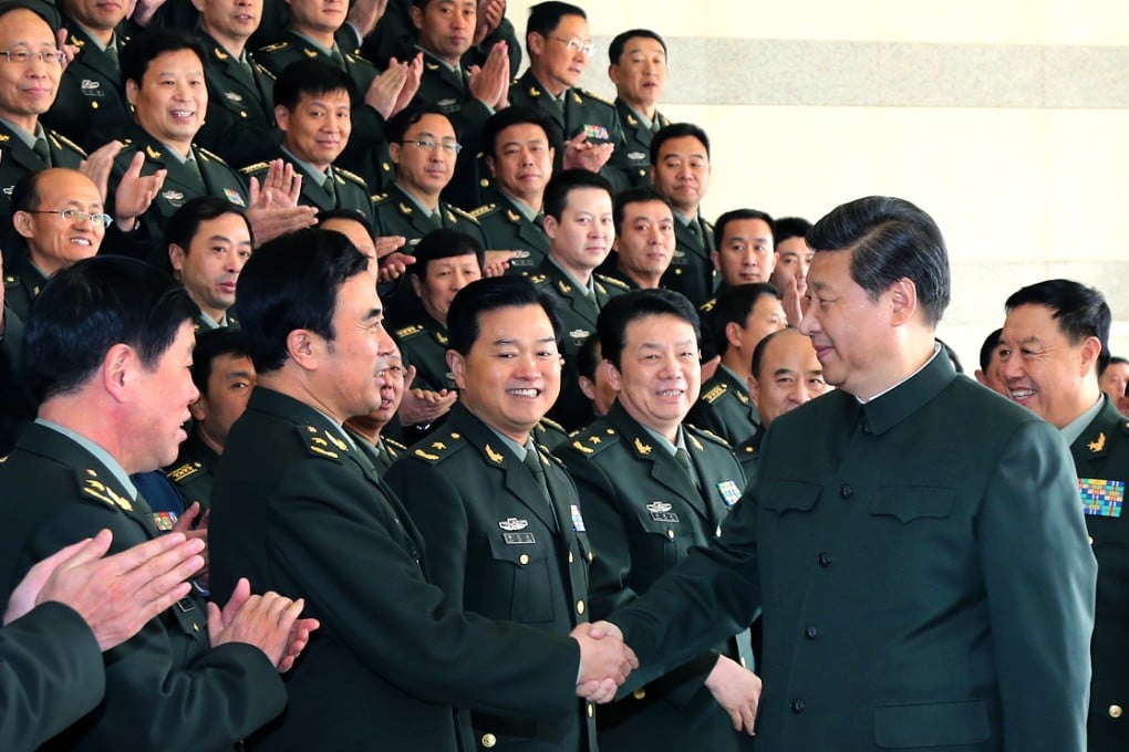 President Xi Jinping shakes hands with division commanders at the Jinan Military Area Command in Jinan, Shandong. Photo: Xinhua